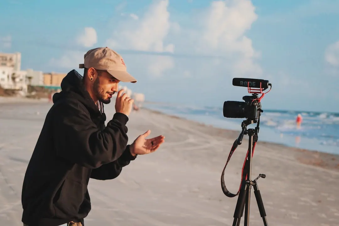 Content creator filming a video with a camera